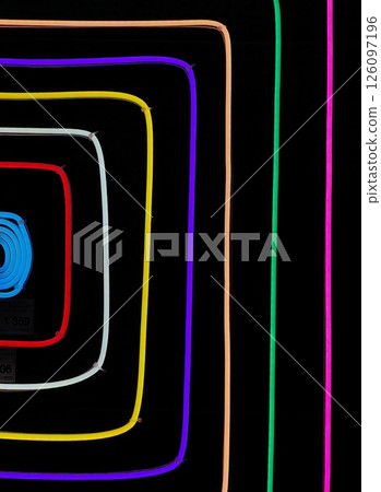 abstract glowing lines create mesmerizing patterns against dark background creative display light. abstract glowing lines create mesmerizing patterns against dark background creative display light. 126097196