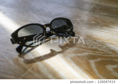 sunglasses on the table 126097414