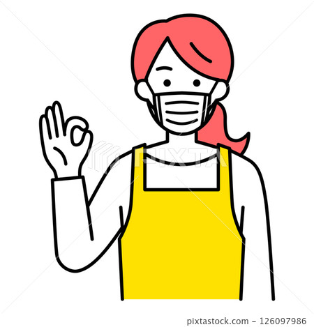 A woman in an apron wearing a mask and making an OK sign A woman in an apron wearing a mask and making an OK sign 126097986