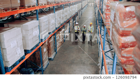 Logistics, warehouse and team walking for inspection, stock inventory or management by shelves. Above industrial employees, mature people and supply chain with safety, depot or wholesale storage 126098794