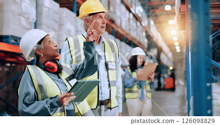 Warehouse, team and tablet for stock storage, inventory planning and mature supervisor pointing at shelf. Shipping, engineer and people with technology for supply chain, distribution or logistics 126098829