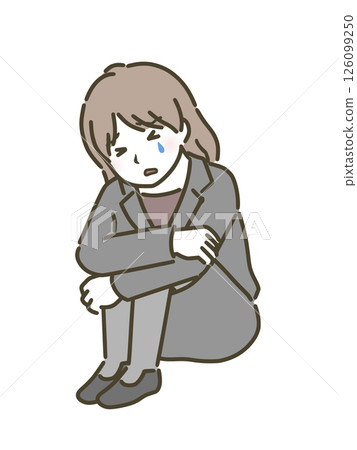 A young woman (suit) holding her knees and crying 126099250