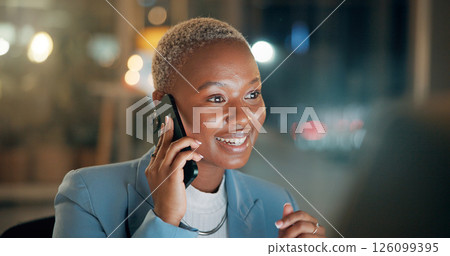 Black woman, computer and phone call in office at night for discussion, finance chat and schedule update. Person, mobile and communication of contact, financial feedback and funding offer of overtime 126099395