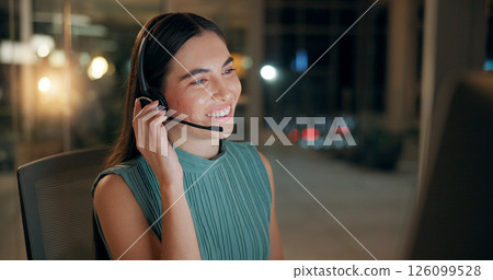 Night, call center and happy business woman listening for customer service, IT advice or troubleshooting. Headset, consultant or communication for technical support, help desk or overtime on computer 126099528