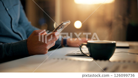 Hands, night and man with smartphone, business and coffee with social media, texting or internet. Closeup, evening or person in office, mobile user or cellphone with digital app, tea or communication 126099736