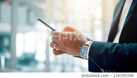 Cellphone, hands and businessman in office for communication, contact or networking online for career. Phone, closeup and male financial manager with email for investment, profit or finance report. Cellphone, hands and businessman in office for communication, contact or networking online for career. Phone, closeup and male financial manager with email for investment, profit or finance report. 126100396
