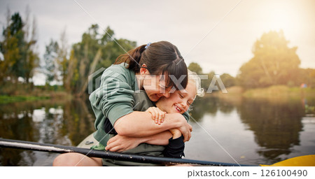 River, mother and child with hug for kayak, water activity or adventure for bonding together. Lake, mom and happy kid with learning for canoeing, travel holiday and paddle outdoor as family in boat 126100490