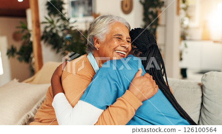 Hug, kindness and nurse with old woman on sofa for healthcare advice, support and trust. Medical caregiver, retirement and consulting with senior patient in nursing home for help and elderly care 126100564