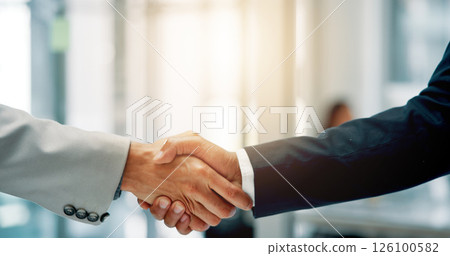 Handshake, agreement and business men in office with partnership, contract or merger. Meeting, thank you and finance manager shaking hands with investor for investment opportunity or negotiation. Handshake, agreement and business men in office with partnership, contract or merger. Meeting, thank you and finance manager shaking hands with investor for investment opportunity or negotiation. 126100582
