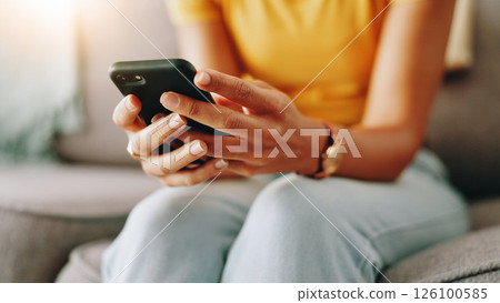 Typing, home and hands of person with phone for connection, social media and networking. Living room, closeup and girl on smartphone for website search, internet and communication for online chat 126100585