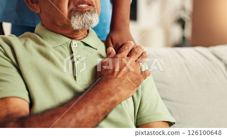 Holding hands, comfort and nurse with old man on sofa for healthcare advice, support and trust. Medical caregiver, retirement and cancer growth with senior patient in nursing home for counseling 126100648