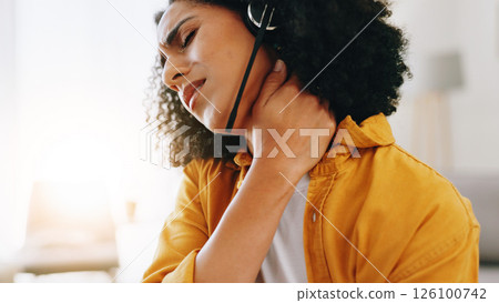Woman, remote work and neck pain with headset, burnout and massage muscle in home. Virtual assistant, African person and injury in agency with bad posture, frustrated and overworked consultant Woman, remote work and neck pain with headset, burnout and massage muscle in home. Virtual assistant, African person and injury in agency with bad posture, frustrated and overworked consultant 126100742