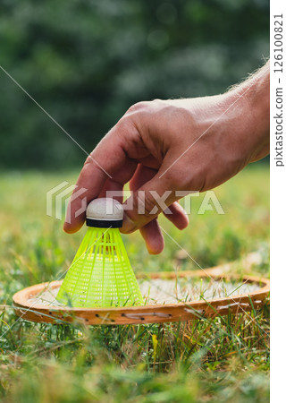 Wooden badminton rackets and shuttlecocks soft focus concept. Copy space Summer outdoor activities. Staycation leisure 126100821