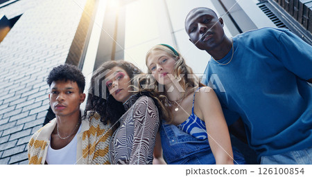 Below, fashion and portrait of friends in city with confidence for style, trendy clothes and outfit. Low angle, creative and men and women in urban town for perspective, aesthetic and photography 126100854