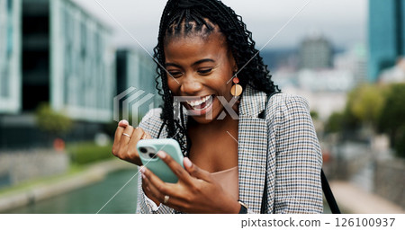 Black woman, city and happy surprise with phone for online giveaway, fist or social media promo. Bonus, reward or good news in email, opportunity and happiness outdoor for feedback on mobile app Black woman, city and happy surprise with phone for online giveaway, fist or social media promo. Bonus, reward or good news in email, opportunity and happiness outdoor for feedback on mobile app 126100937