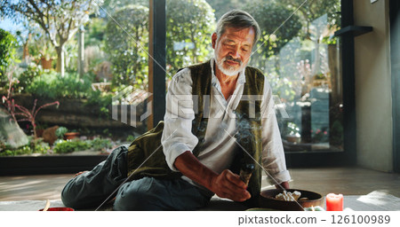 Healing, smoke and holistic with asian man and incense for spiritual retreat, self care ritual and burning herbs. Aromatherapy, mindfulness and wellness ceremony with senior person for aura cleanse 126100989