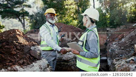 Construction site, handshake and people happy for partnership outdoor to start foundation. Man, woman or engineers with radio for excavation, agreement or collaboration and shaking hands for deal Construction site, handshake and people happy for partnership outdoor to start foundation. Man, woman or engineers with radio for excavation, agreement or collaboration and shaking hands for deal 126101042