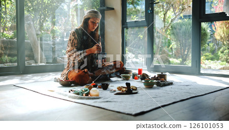 Crystal, alternative medicine and woman on floor for spiritual meditation, holistic treatment and healing. Aromatherapy, cleanse and person with stones for balance, chakra and detox for wellness 126101053