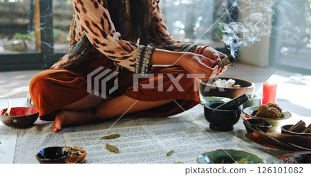 Healing, smoke and holistic with hands of woman for spiritual retreat, self care ritual and burning herbs. Naturopath, mindfulness and smudge ceremony with closeup of person for aura cleanse Healing, smoke and holistic with hands of woman for spiritual retreat, self care ritual and burning herbs. Naturopath, mindfulness and smudge ceremony with closeup of person for aura cleanse 126101082