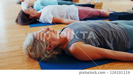 Relax, meditation and senior woman in class for calm, wellness and mindfulness with inner peace. Self care, health and female person with breathing on yoga mat for holistic healing, zen or balance. 126101119