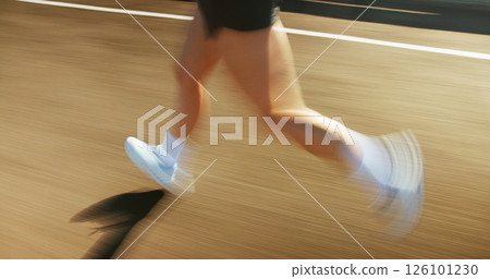 Motion blur, fitness and legs of person running on bridge in city for race, marathon or training. Sports, fast and feet of athlete on highway with cardio workout, challenge or exercise in town. Motion blur, fitness and legs of person running on bridge in city for race, marathon or training. Sports, fast and feet of athlete on highway with cardio workout, challenge or exercise in town. 126101230