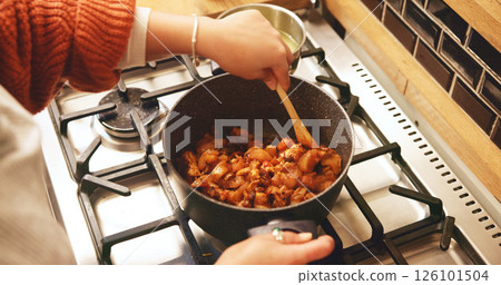 Hands, stirring pot and chicken in home, stove and heat for soup, ingredients and nutrition in kitchen. Person, chef and meal prep with food, diet and above with cooking, recipe or meat at house 126101504