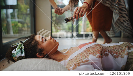 Spiritual, healing and woman with shaman, hands and smudging for cleansing, traditional and inner peace. Holistic, sage and smoke for awakening of person, chakra and ritual to remove negative energy 126101509