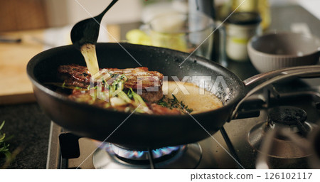 Cooking, stove or steak in pan with sauce in kitchen for culinary skill, recipe or meal prep for dinner. Food, chef and person with beef, protein or seasoning for gourmet dish, ingredients or cuisine Cooking, stove or steak in pan with sauce in kitchen for culinary skill, recipe or meal prep for dinner. Food, chef and person with beef, protein or seasoning for gourmet dish, ingredients or cuisine 126102117