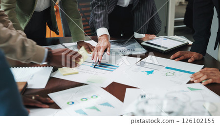 Hands, documents and business people in office with statistics, data or graphs for finance. Team, meeting and group of financial planners with paperwork for investment, profit or budget report. 126102155
