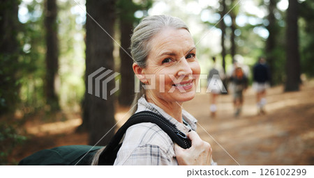 Hiking, nature and portrait of mature woman with backpack for exercise, workout and walking for wellness. Fitness, travel and person in forest and woods for trekking, adventure and journey outdoor 126102299