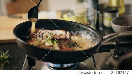 Cooking, steak and pan for meal, kitchen and preparation for dinner in restaurant, seasoning or cuisine. Catering business, ingredients and culinary skills for food in diner, spoon or herb for flavor 126102367