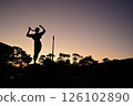 Silhouette of a bronze statue at Chiba Port Park during magic hour 126102890