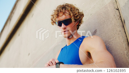 Fitness, man and smart watch at wall for time, tracking progress and cardio assessment in app. Runner, below and tech in city for stopwatch, challenge update and training notification at space Fitness, man and smart watch at wall for time, tracking progress and cardio assessment in app. Runner, below and tech in city for stopwatch, challenge update and training notification at space 126102895