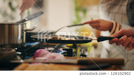Cooking, food and pan with people in kitchen of restaurant closeup for diet, health or nutrition. Gas stove, ingredients and recipe with chef team in hotel for gourmet cuisine, hospitality or service 126102902