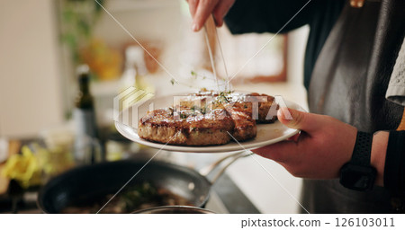 Hands, chef and plate with steak, kitchen and preparation for beef in restaurant or culinary skills. Catering business, process and person with presentation of meat, hospitality or herbs for gourmet Hands, chef and plate with steak, kitchen and preparation for beef in restaurant or culinary skills. Catering business, process and person with presentation of meat, hospitality or herbs for gourmet 126103011