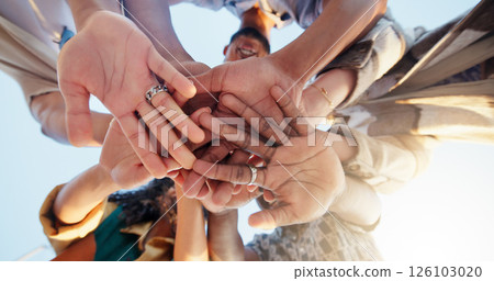 Hands stack, low angle and group of friends outdoor with community, collaboration or support. Circle, teamwork and people with palms together for solidarity, goals or target in huddle from below. Hands stack, low angle and group of friends outdoor with community, collaboration or support. Circle, teamwork and people with palms together for solidarity, goals or target in huddle from below. 126103020