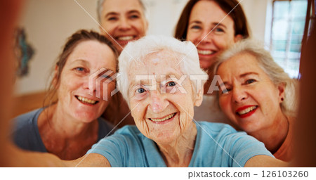 Selfie, senior and smile with woman friends in home together for bonding, fitness or visit. Photograph, profile picture and social media with group of old people in retirement apartment for yoga 126103260