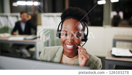 Call center, headset and happy woman on computer for telemarketing, crm or coworking at night. Agent, contact us and listening for customer service with lead generation, outbound telecom or overtime 126103278