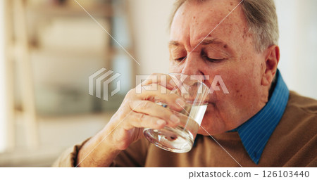 Drinking, water and senior man in home, healthcare and prevention of dehydration, thirsty and retirement. House, hydration and elderly person with liquid in living room, treatment and pensioner 126103440