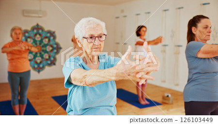 Yoga studio, senior women and fitness with instructor, spiritual wellness and pilates. Elderly people, trainer and group in health club, balance and coach with exercise, retirement and stretching Yoga studio, senior women and fitness with instructor, spiritual wellness and pilates. Elderly people, trainer and group in health club, balance and coach with exercise, retirement and stretching 126103449