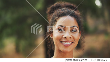 Woman, portrait and smile with hiking in forest for travel adventure, vacation break and sightseeing nature. Space, person and trekking in woods for holiday exploration, wellness journey and getaway 126103677