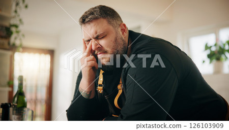 Cooking, fatigue and stress with man in kitchen of home for crisis, failure or mistake. Frustration, headache and recipe disaster with chef in apartment for burnout, loss or small business startup 126103909