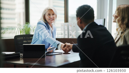Business, woman and handshake with couple in office for finance consultation, debt management and welcome. Financial advisor, mature person and shaking hands in meeting for insurance planning or help 126103930