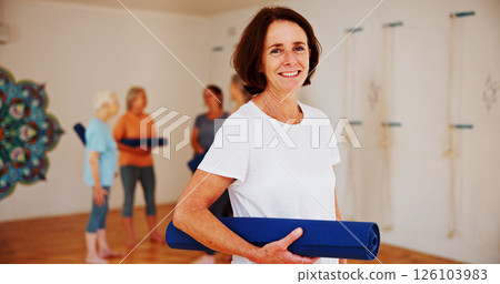 Portrait, smile and yoga mat with woman in studio for exercise, fitness or wellness routine. Balance, health and pilates with happy mature person in class for awareness, mindfulness or inner peace Portrait, smile and yoga mat with woman in studio for exercise, fitness or wellness routine. Balance, health and pilates with happy mature person in class for awareness, mindfulness or inner peace 126103983