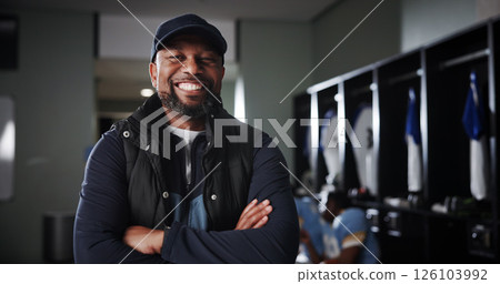 Black man, portrait and coach for sports with smile in locker room, confident for football match or tournament. Happy, pride and personal trainer with exercise, training and arms crossed in Chicago Black man, portrait and coach for sports with smile in locker room, confident for football match or tournament. Happy, pride and personal trainer with exercise, training and arms crossed in Chicago 126103992
