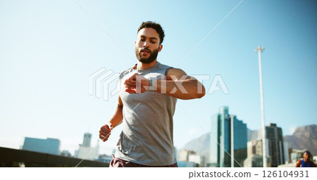 Man, fitness and running with watch in city for workout app, exercise or tracking performance. Active, male person or runner checking wristwatch for steps, calories or monitoring heart rate in town Man, fitness and running with watch in city for workout app, exercise or tracking performance. Active, male person or runner checking wristwatch for steps, calories or monitoring heart rate in town 126104931