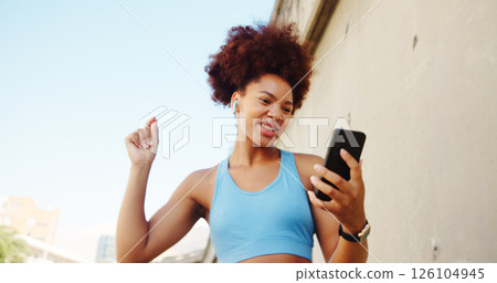Fitness, dancing and girl on break in city for running, outdoor workout or training motivation. Playlist, earphones and happy runner with music for sports routine, exercise or wellness for health 126104945