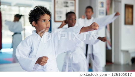 Exercise, karate and sports with kids in dojo for combat, fighting or self defense training. Fitness, learning or growth with group of boy children in class for martial arts lesson or practice Exercise, karate and sports with kids in dojo for combat, fighting or self defense training. Fitness, learning or growth with group of boy children in class for martial arts lesson or practice 126105017