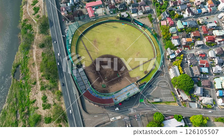 Aerial view of modern city and baseball field 126105507