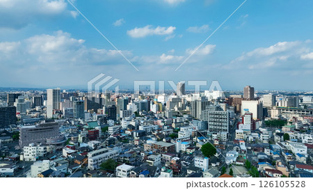 Aerial view of modern city and blue sky Aerial view of modern city and blue sky 126105528
